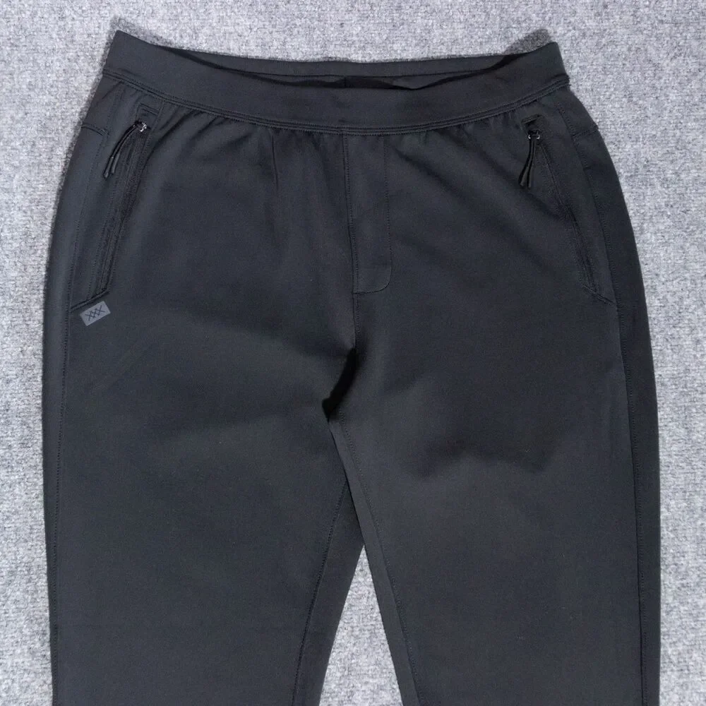 Rhone Warm Up Tech Jogger Pants Men's Large Black Performance Stretch Zip Pocket